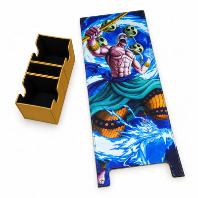 A printed gaming playmat featuring an anime-style character with a trident and blue water-themed artwork, shown next to a gold three-compartment storage box on a white background.